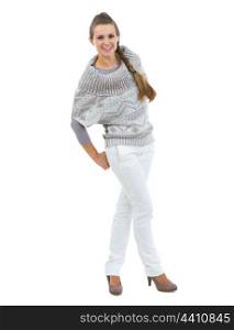 Full length portrait of happy young woman in sweater