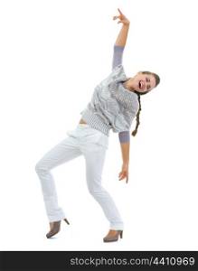 Full length portrait of happy young woman in sweater dancing