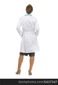 Full length portrait of medical doctor woman. Rear view