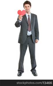 Full length portrait of modern man in business suit with paper heart