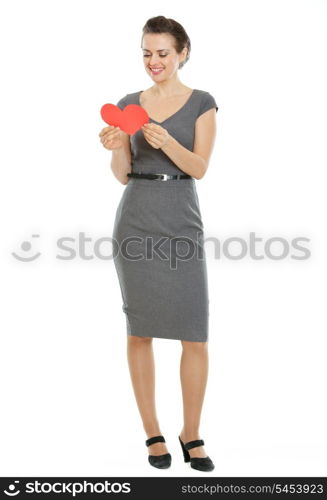 Full length portrait of modern woman reading heart shaped postcard