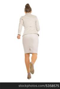 Full length portrait of running business woman . rear view