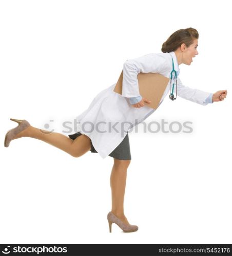 Full length portrait of running medical doctor woman