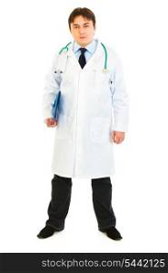 Full length portrait of serious doctor holding medical chart in hand isolated on white&#xA;