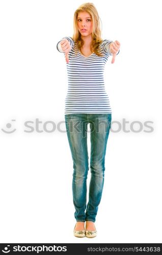 Full length portrait of shocked teen girl showing thumbs up gesture&#xA;
