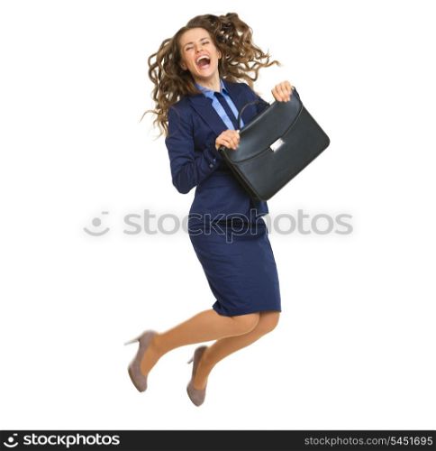 Full length portrait of smiling business woman with briefcase jumping