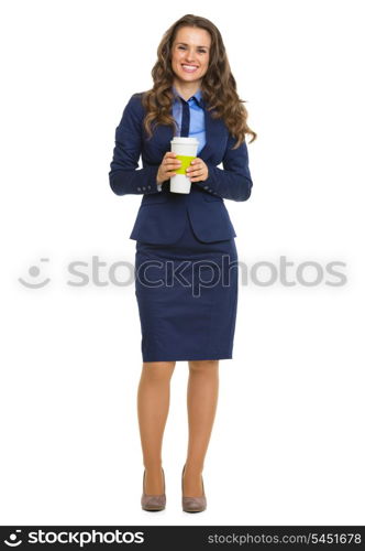 Full length portrait of smiling business woman with cup of hot beverage