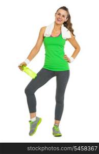 Full length portrait of smiling fitness young woman with bottle of water