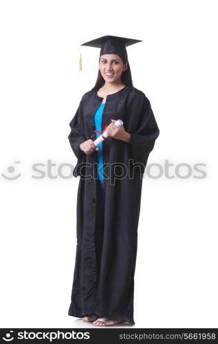 Full length portrait of smiling graduate student holding diploma over white background