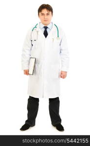 Full length portrait of smiling medical doctor holding clipboard isolated on white&#xA;