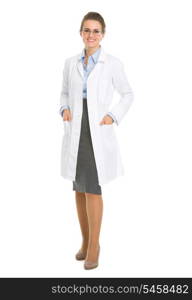 Full length portrait of smiling ophthalmologist doctor woman in eyeglasses