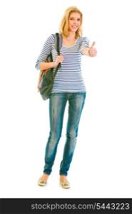 Full length portrait of smiling teen girl with schoolbag showing thumbs up gesture isolated on white &#xA;