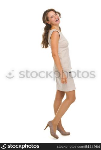 Full length portrait of smiling young woman