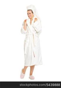 Full length portrait of smiling young woman in bathrobe