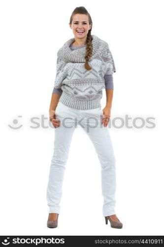 Full length portrait of smiling young woman in sweater