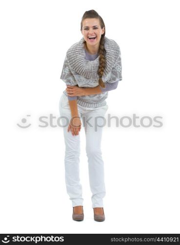 Full length portrait of smiling young woman in sweater