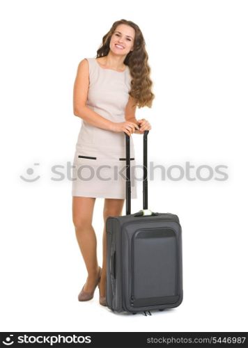 Full length portrait of smiling young woman with wheel bag