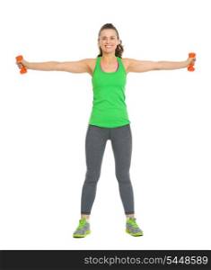 Full length portrait of smiling young woman workout with dumbbells