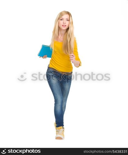 Full length portrait of student girl running straight