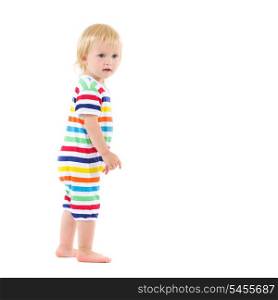 Full length portrait of thoughtful baby in swimsuit