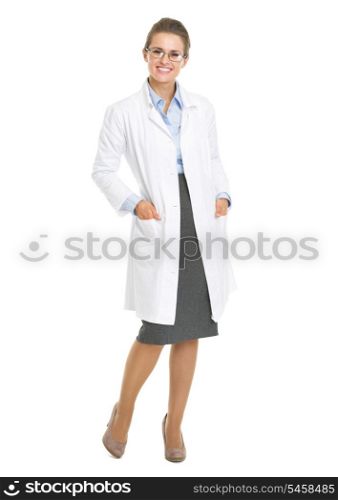 Full length portrait of woman ophthalmologist doctor wearing glasses