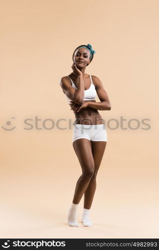 Full length portrait of young african athletic girl