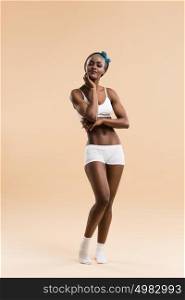Full length portrait of young african athletic girl