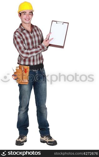 full-length portrait of young craftsman holding clipboard