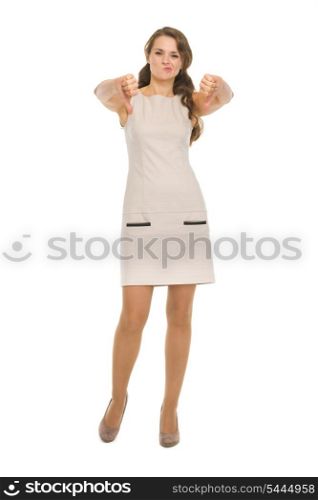 Full length portrait of young woman showing thumbs down