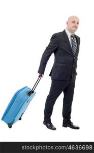 Full length side view of young businessman with luggage walking isolated on white background