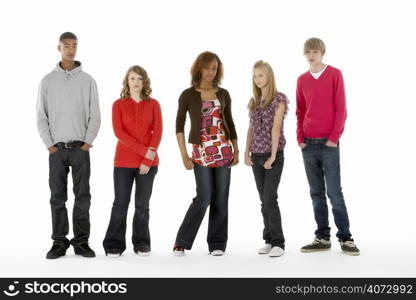 Full Length Studio Portrait Of Five Teenage Friends