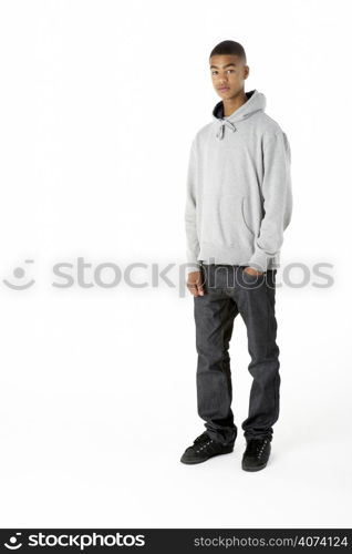 Full Length Studio Portrait Of Teenage Boy