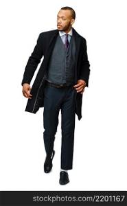 full length studio shot of a african-american businessman wearing coat Isolated on white background.. full length studio shot of a african-american businessman wearing coat Isolated on white background