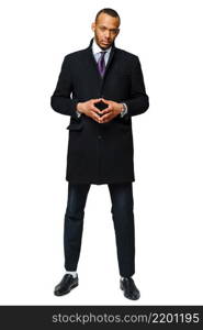 full length studio shot of a african-american businessman wearing coat Isolated on white background.. full length studio shot of a african-american businessman wearing coat Isolated on white background