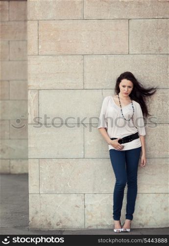 Full length stylish young girl posing on street&#xA;