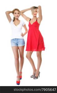 Full length two beautiful sexy crazy women in summer clothes. Studio portrait isolated on white background.