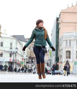 Full length, Walking woman in autumn Moscow street