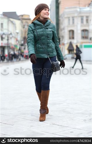Full length, Walking woman in autumn Moscow street