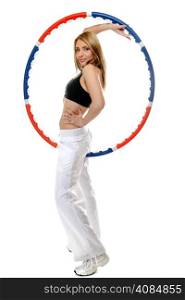 Full length young sporty girl doing exercise with hula hoop. Fitness woman isolated on white