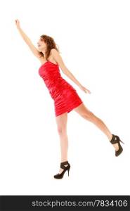 Full length young woman teen girl in elegant red dress raise her hand up holding imaginary invisible balloons and flying isolated on white background