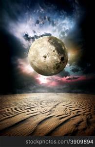 Full moon and beautiful clouds in desert. Elements of this image furnished by NASA