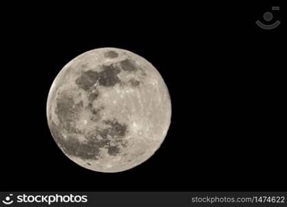 Full moon image with telescope, you can see some craters and lines. full moon in the dark