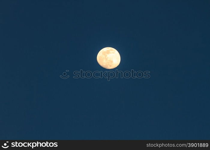 Full moon over dark sky at night