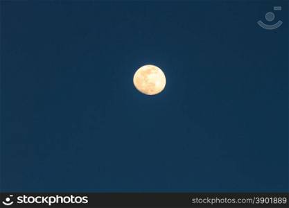 Full moon over dark sky at night