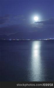 Full moon over Mediterranean Sea and moon-glade, Crete Island, Greece