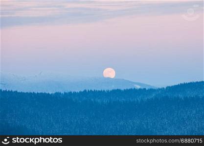 Full moon rising over winter Smoky Mountains. Great Smoky Mountains National Park, USA