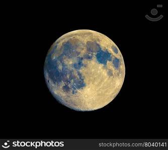 Full moon seen with telescope, enhanced colours. Full moon seen with an astronomical telescope, with heavily enhanced colours to show the real colours of terrain surface