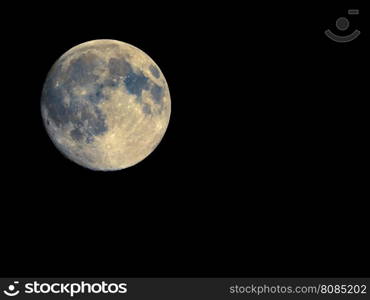 Full moon seen with telescope, enhanced colours. Full moon seen with an astronomical telescope, with enhanced colours to show the real colours of terrain surface - with copy space