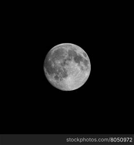 Full moon seen with telescope. Full moon seen with an astronomical telescope, high resolution, in black and white - with copy space