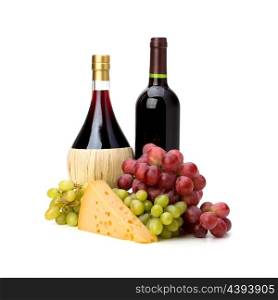 Full red wine bottles and grapes isolated on white background